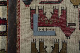 Close-up detail of 2000s Persian Gabbeh rug from Iran / Persia showing Wool weave