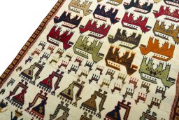 Backside of handmade 2000s Persian Gabbeh rug showing knot structure and weave density