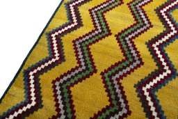 Backside of handmade 2000s Persian Gabbeh rug showing knot structure and weave density