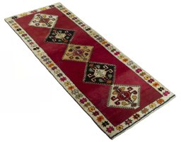 Close-up detail of 2000s Persian Gabbeh rug from Iran / Persia showing Wool weave