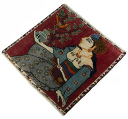 Corner detail of 2000s Persian Gabbeh rug showing border pattern and Wool pile