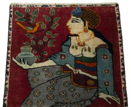 Surface texture of 2000s Persian Gabbeh rug with natural Wool and intricate pattern