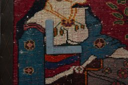 Backside of handmade 2000s Persian Gabbeh rug showing knot structure and weave density