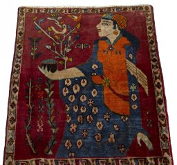 Surface texture of 2000s Persian Gabbeh rug with natural Wool and intricate pattern