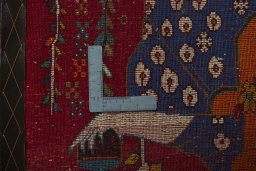 Backside of handmade 2000s Persian Gabbeh rug showing knot structure and weave density