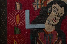 Backside of handmade 2000s Persian Gabbeh rug showing knot structure and weave density