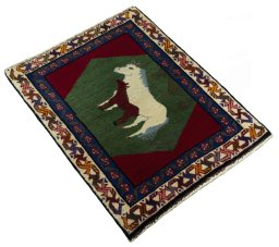 Close-up detail of 2000s Persian Gabbeh rug from Iran / Persia showing Wool weave
