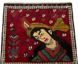 Surface texture of 2000s Persian Gabbeh rug with natural Wool and intricate pattern