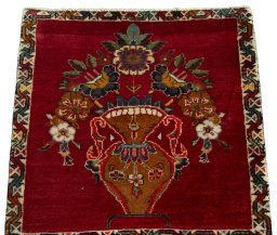 Surface texture of 2000s Persian Gabbeh rug with natural Wool and intricate pattern