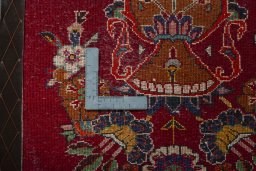 Backside of handmade 2000s Persian Gabbeh rug showing knot structure and weave density