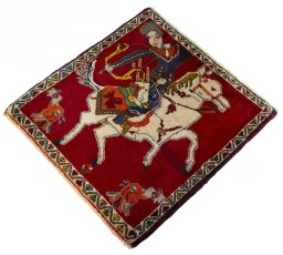 Corner detail of 2000s Persian Gabbeh rug showing border pattern and Wool pile