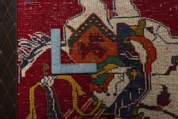 Backside of handmade 2000s Persian Gabbeh rug showing knot structure and weave density