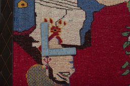 Backside of handmade 2000s Persian Gabbeh rug showing knot structure and weave density