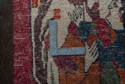 Backside of handmade 2000s Persian Gabbeh rug showing knot structure and weave density