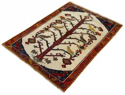 Corner detail of 2000s Persian Gabbeh rug showing border pattern and Wool pile