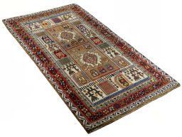 Close-up detail of 2000s Persian Gabbeh rug from Iran / Persia showing Wool weave