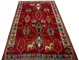 Surface texture of 2000s Persian Gabbeh rug with natural Wool and intricate pattern
