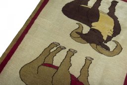Backside of handmade 2000s Persian Gabbeh rug showing knot structure and weave density