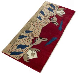 Close-up detail of 2000s Persian Gabbeh rug from Iran / Persia showing Wool weave
