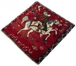 Corner detail of 2000s Persian Gabbeh rug showing border pattern and Wool pile