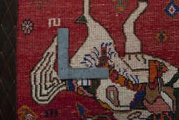 Backside of handmade 2000s Persian Gabbeh rug showing knot structure and weave density