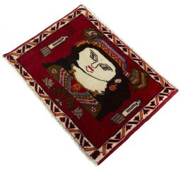 Corner detail of 2000s Persian Gabbeh rug showing border pattern and Wool pile