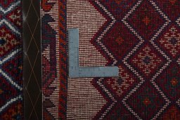 Close-up detail of 2000s Persian Gabbeh rug from Iran / Persia showing Wool weave