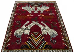 Surface texture of 1970s Persian Gabbeh rug with natural Wool and intricate pattern