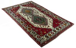 Close-up detail of 2000s Persian Gabbeh rug from Iran / Persia showing Wool weave
