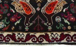 Central medallion detail of 2000s Persian Gabbeh rug from Iran / Persia