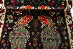 Full view of 2000s Persian Gabbeh rug from Iran / Persia, 151 × 100 cm in Brown tones