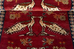 Full view of 2000s Persian Gabbeh rug from Iran / Persia, 186 × 100 cm in Red tones