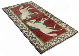Close-up detail of 2000s Persian Gabbeh rug from Iran / Persia showing Wool weave