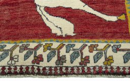Central medallion detail of 2000s Persian Gabbeh rug from Iran / Persia