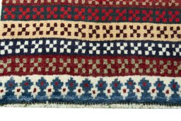 Central medallion detail of 2000s Persian Gabbeh rug from Iran / Persia
