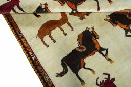 Full view of 2000s Persian Gabbeh rug from Iran / Persia, 215 × 155 cm in Beige tones