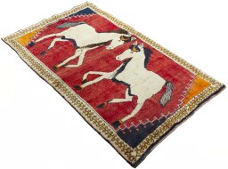 Close-up detail of 2000s Persian Gabbeh rug from Iran / Persia showing Wool weave