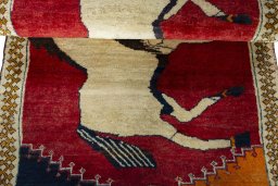 Full view of 2000s Persian Gabbeh rug from Iran / Persia, 153 × 93 cm in Red tones