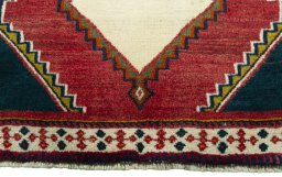 Central medallion detail of 2000s Persian Gabbeh rug from Iran / Persia