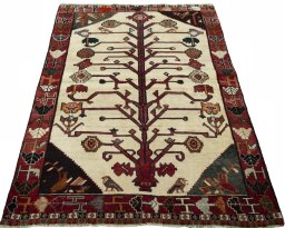 Surface texture of 2000s Persian Gabbeh rug with natural Wool and intricate pattern