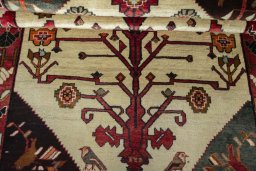 Full view of 2000s Persian Gabbeh rug from Iran / Persia, 187 × 120 cm in Beige tones