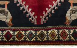 Close-up detail of 2000s Persian Gabbeh rug from Iran / Persia showing Wool weave