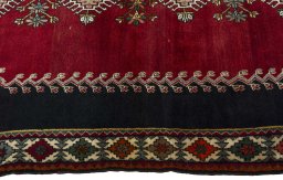 Full view of 2000s Persian Gabbeh rug from Iran / Persia, 245 × 147 cm in Red tones