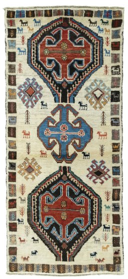 Full view of 2000s Persian Gabbeh rug from Iran / Persia, 188 × 82 cm in Beige tones