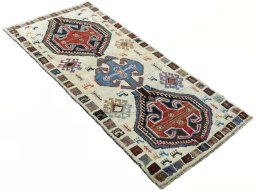 Close-up detail of 2000s Persian Gabbeh rug from Iran / Persia showing Wool weave