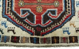 Central medallion detail of 2000s Persian Gabbeh rug from Iran / Persia