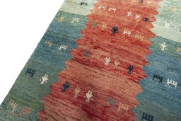 Backside of handmade 1970s Persian Gabbeh rug showing knot structure and weave density