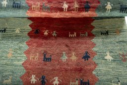 Full view of 1970s Persian Gabbeh rug from Iran / Persia, 183 × 121 cm in Red tones