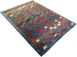 Close-up detail of 2000s Persian Gabbeh rug from Pakistan showing Wool weave