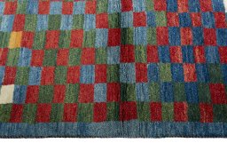 Close-up detail of 2000s Persian Gabbeh rug from Pakistan showing Wool weave